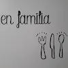En Família